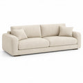 Beżowa sofa trzyosobowa z poduszkami, 230 x 95 x 85 cm